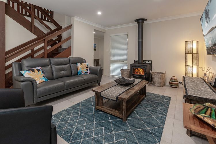 Lounge Room with Fireplace and Sofas