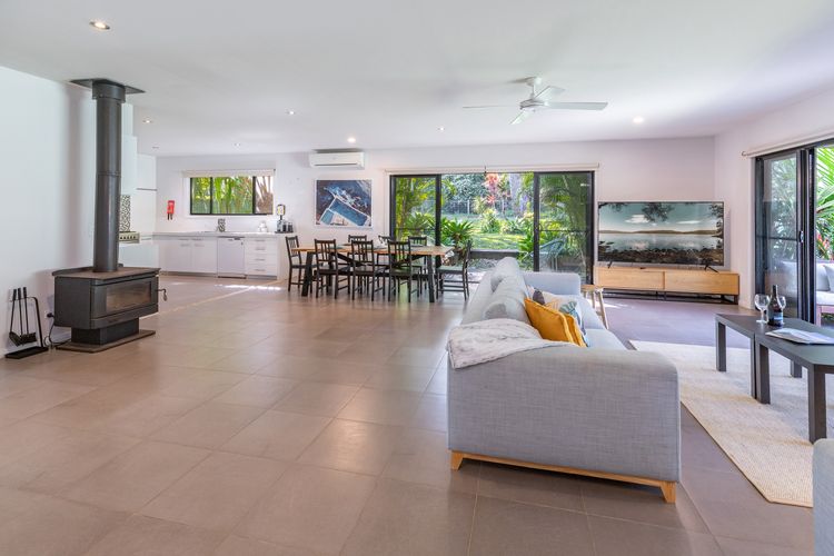 Spacious Living and Dining Area with Fireplace