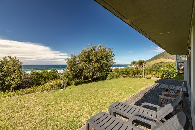 Outdoor Lawn with Sun Lounges and Views