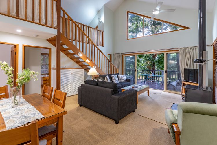 Dining and Living Area with Stairs
