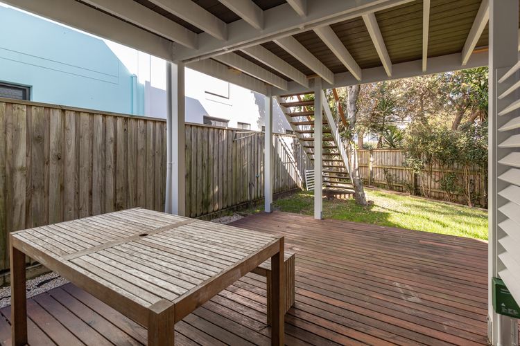 Covered Patio with Wooden Table