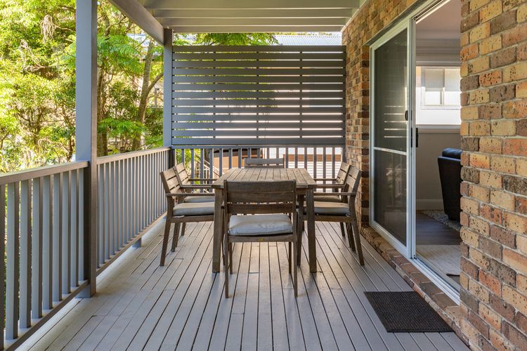 Covered Balcony with Outdoor Dining