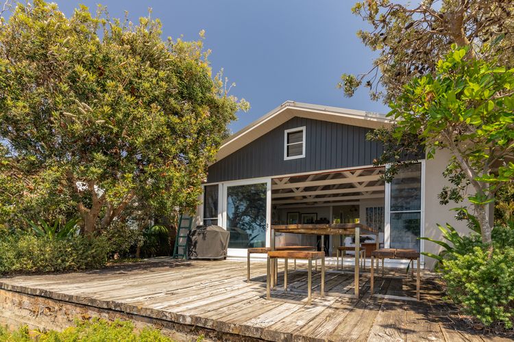 Exterior of House with Deck and Outdoor Dining