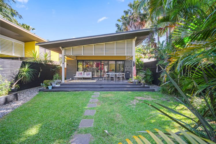 Exterior Back View with Lawn and Deck