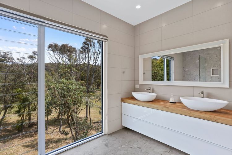 CUTTAGEE VIEWS: 22 Cuttagee Beach Rd- Luxury, ocean, beach front