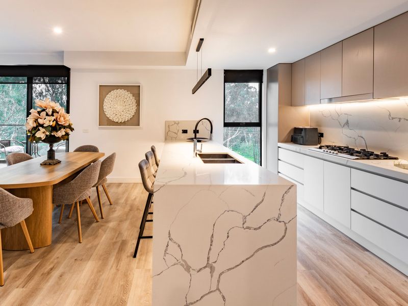 Contemporary kitchen with island seating and dining space
