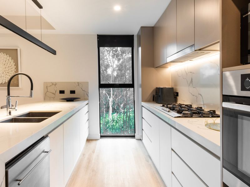 Well-appointed kitchen with ample storage and natural light