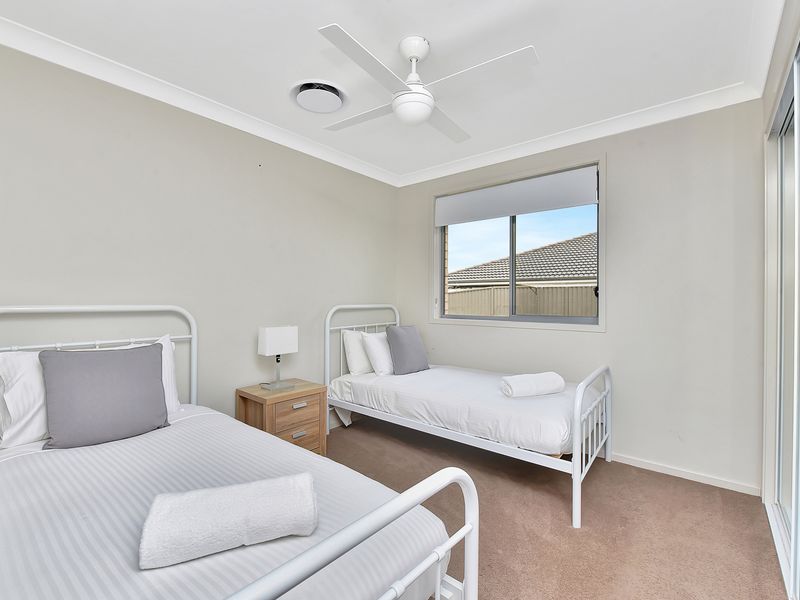 Cozy bedroom with natural light and soft linens