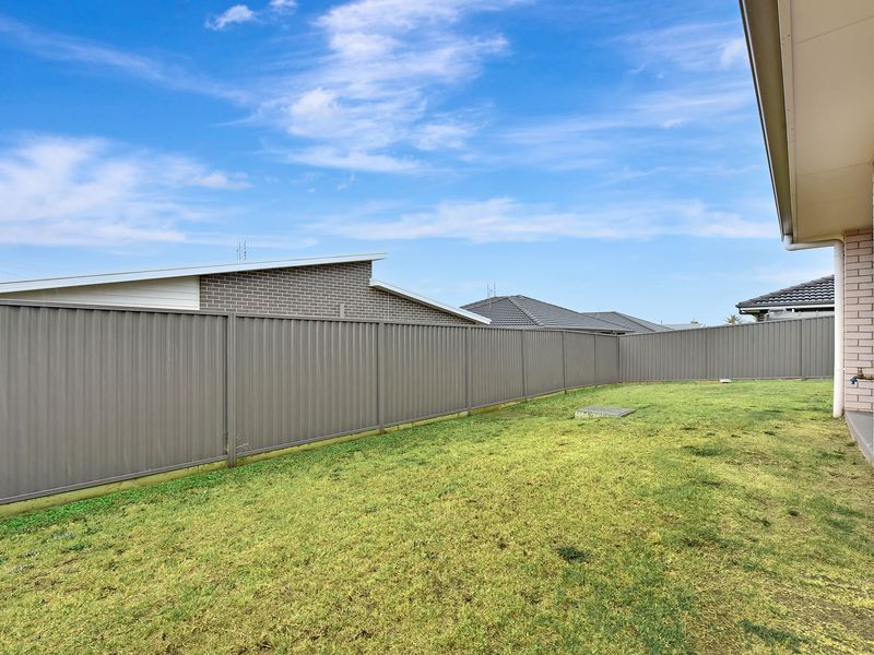 Generous backyard offering plenty of room to unwind outdoors