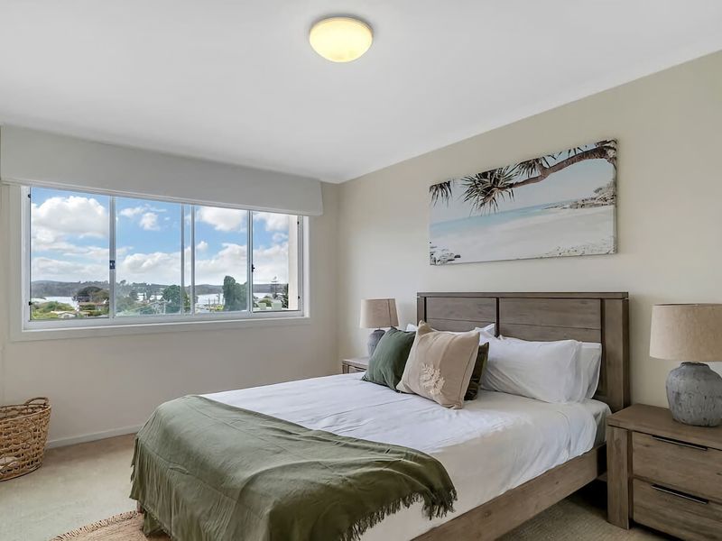 Stunning water view Home moments from town