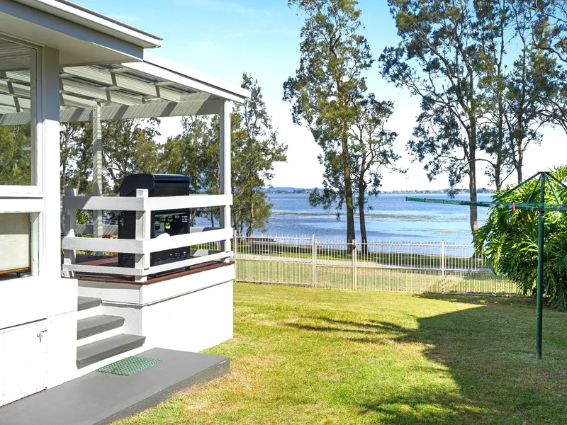 Stunning Lakefront Home with Bonus Studio