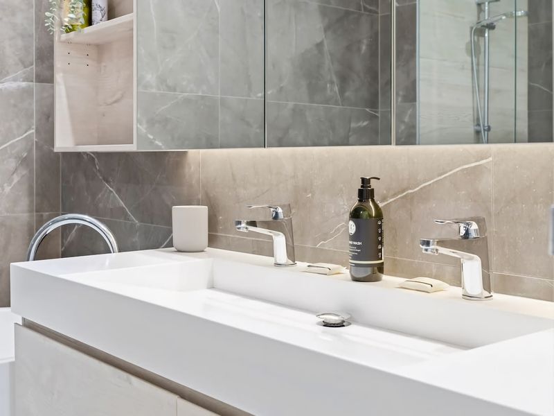 Elegant faucet and mirror combo