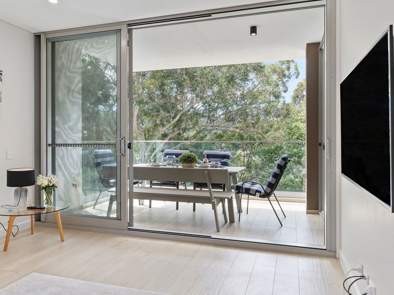 Cozy living with balcony dining