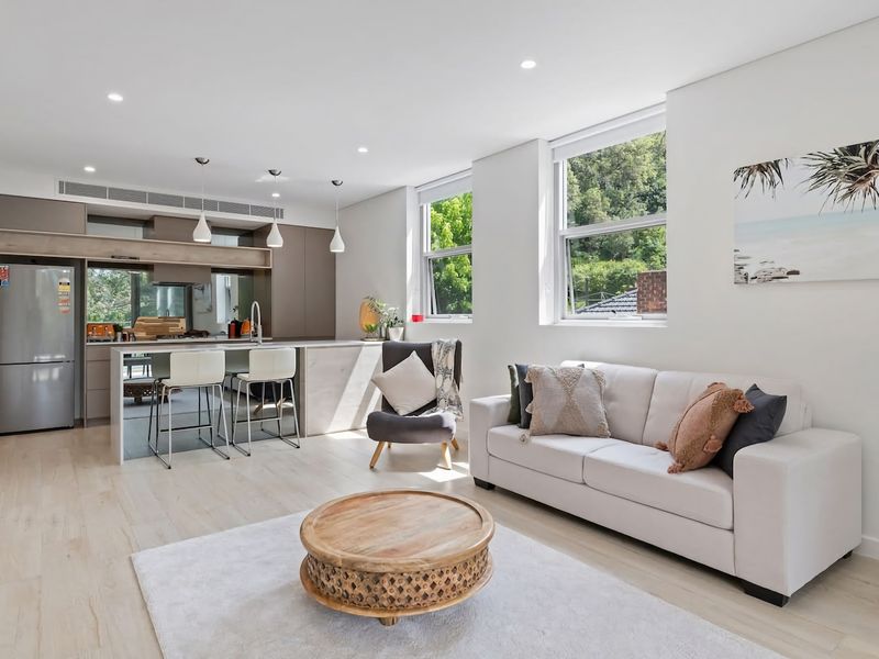 Cozy living with a modern kitchen just steps away