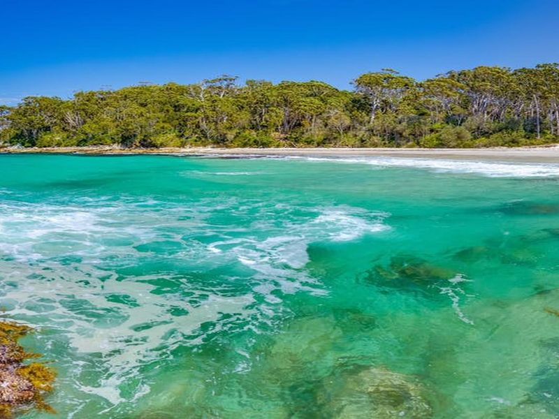 Relaxed Coastal Retreat Just Steps from the Beach