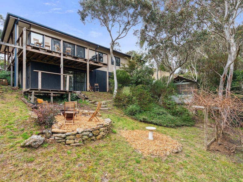 Welcoming exterior surrounded by native bushland.