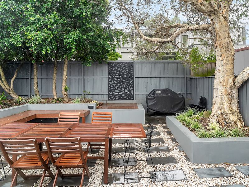 Garden space perfect for fresh air and casual meals.