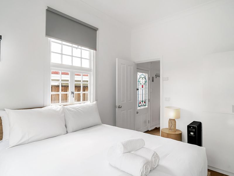 Light-filled bedroom opening straight out to the garden.