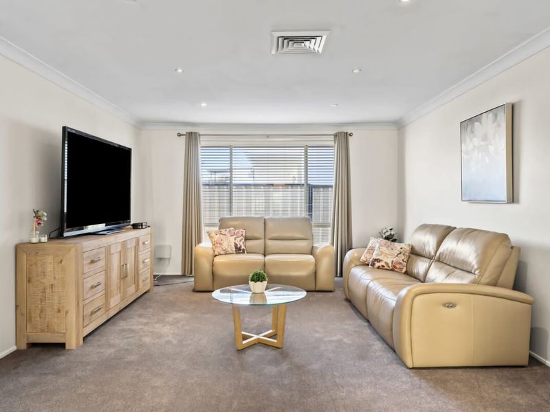 Traditional-style sitting room ideal for reading or casual conversation.