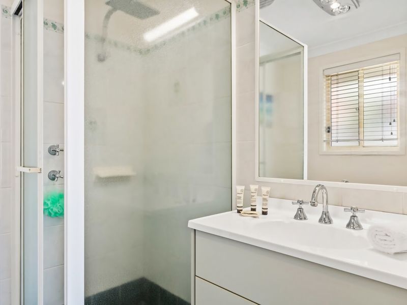 Ensuite bathroom offering simple, comfortable convenience.