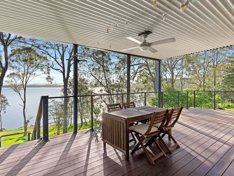 Covered outdoor dining deck perfect for long lunches.