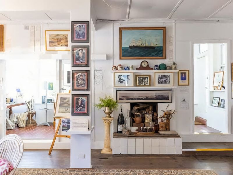 Cozy lounge with fireplace and character-filled décor.