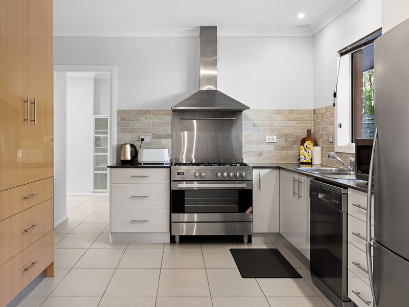 Fully equipped kitchen with modern appliances for easy meals.