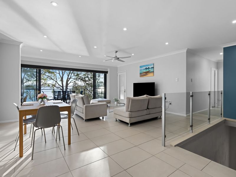 Open-plan living and dining with plenty of natural light.