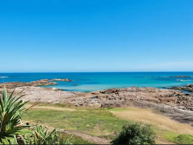 Coastal Oasis Steps to the Water’s Edge