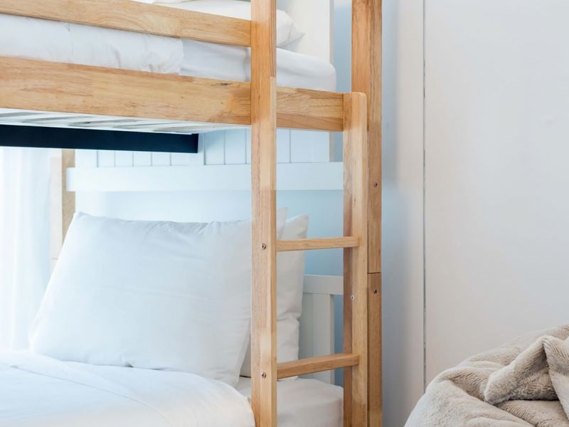 Bright mornings and modern bunks.