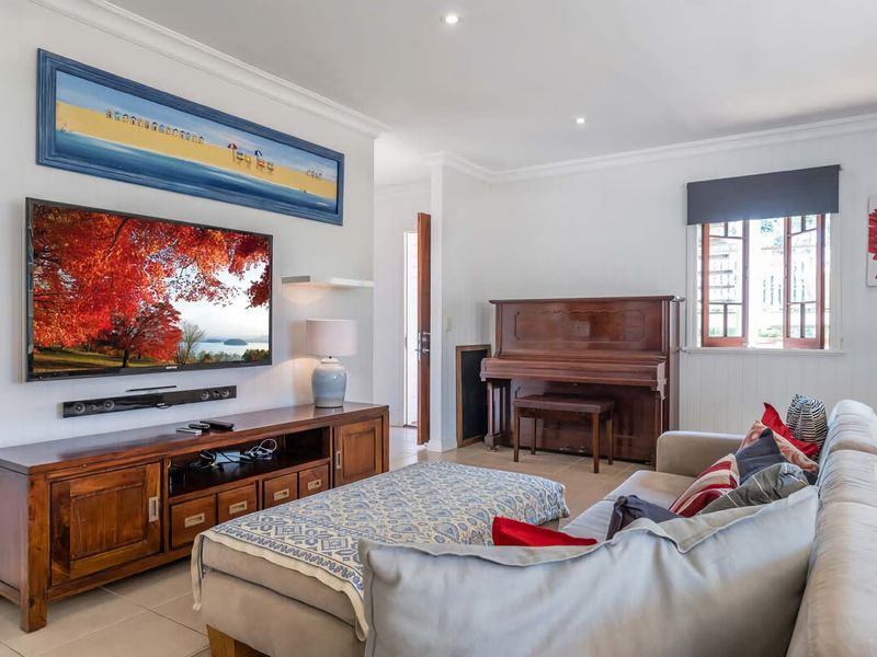 As soon you step inside, you will be greeted by a large and bright living area complete with a pool table and a beautiful piano