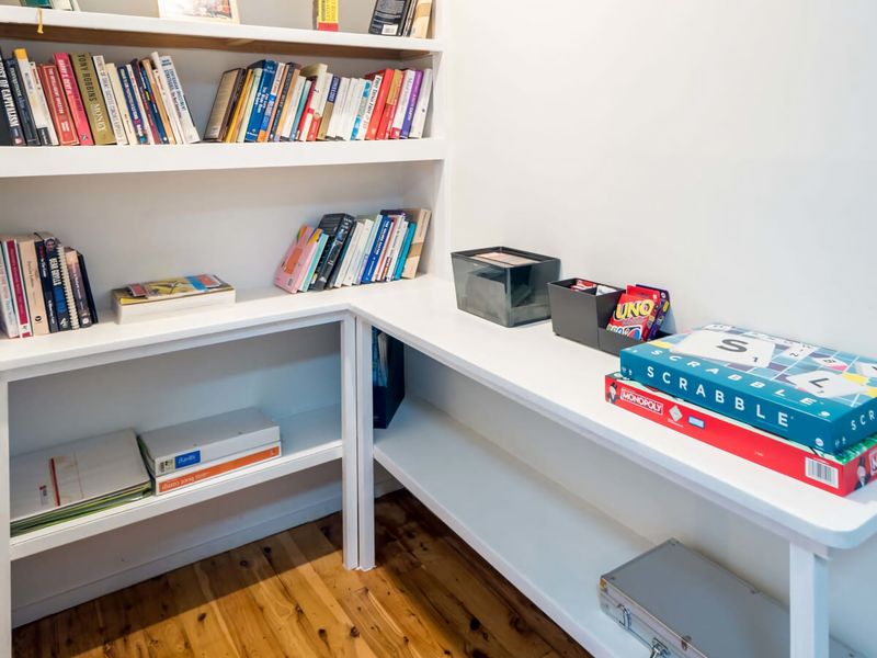 A mini library with a great selection of books and games