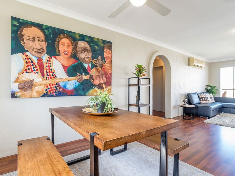Connected to the living area and kitchen, you'll find a dining area which accommodates 4 guests