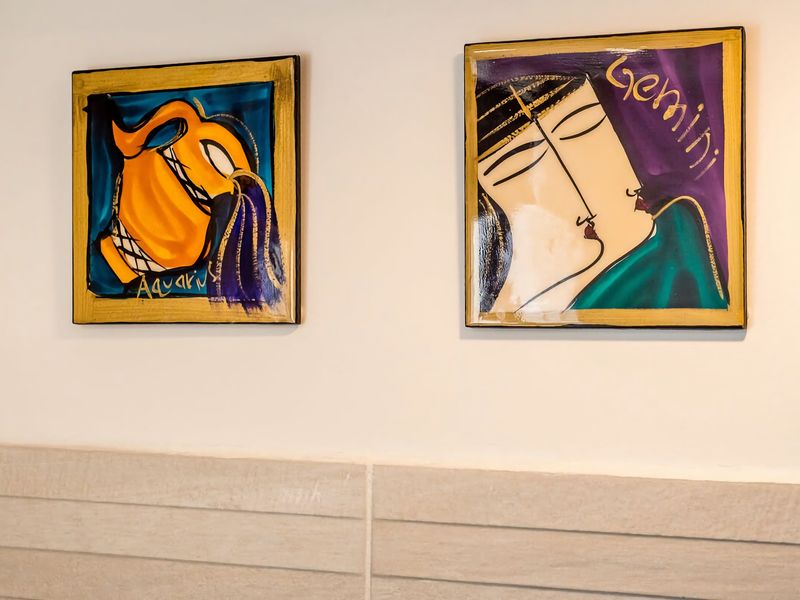 Modern artworks surround the property