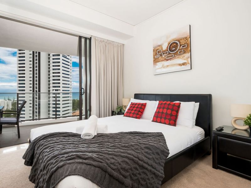 Featuring two bedrooms and two bathrooms, this modern apartment accommodates up to eight guests at a time across two queen beds, a bunk bed and comfortable sofa bed.