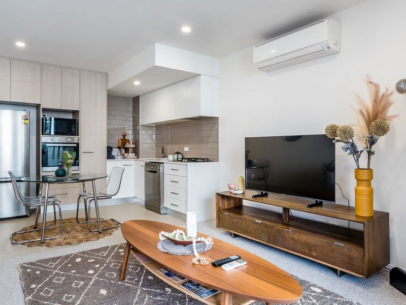 Large TV room couch and coffee table