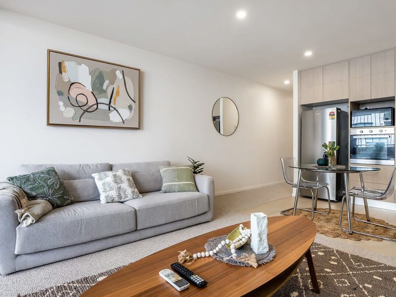 Relax in style in our spacious living area, where comfort and convenience meet.