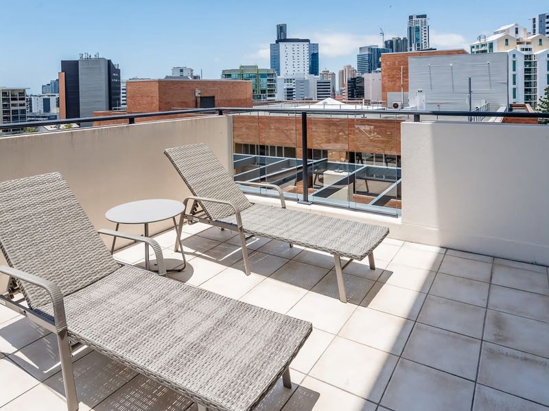 Stylish Central City Retreat with Pool Parking