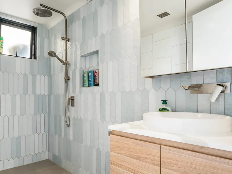 Bathroom with shower overhead