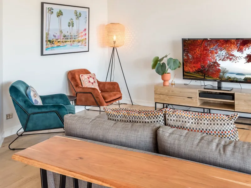 Living area is equipped with comfortable seating, TV and reliable WIFI connection