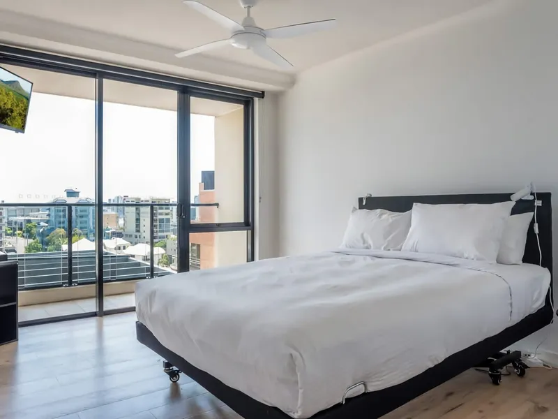 Bedroom 1 with access to a balcony