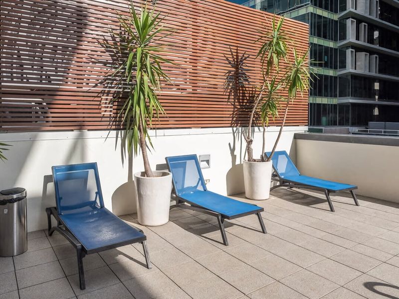 Stylish City Getaway with Pool Gym Parking