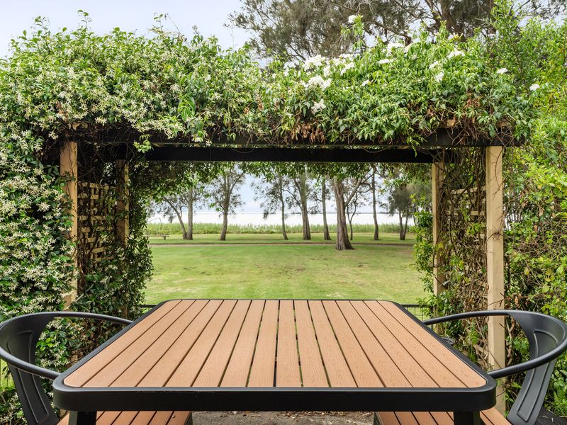 Step outside to the private alfresco area with seating, ideal for evening relaxation.
