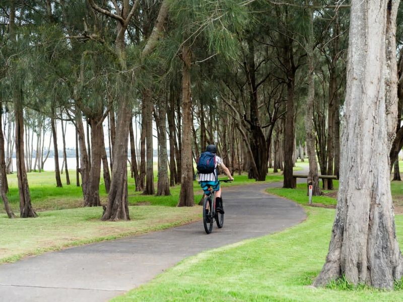 Enjoy a scenic bike ride along the trail, with stunning lake views every turn—perfect for outdoor adventures and nature lovers.