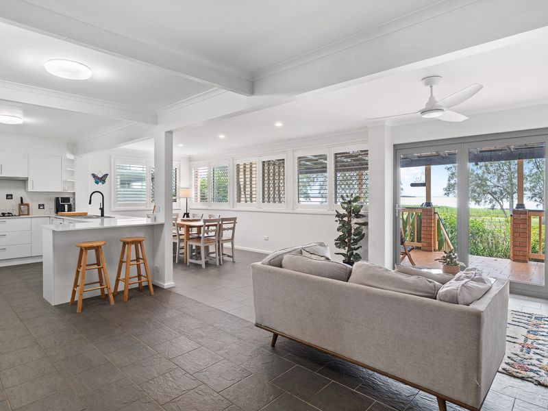 Bright and airy open-plan living area perfect for family gatherings and relaxation.