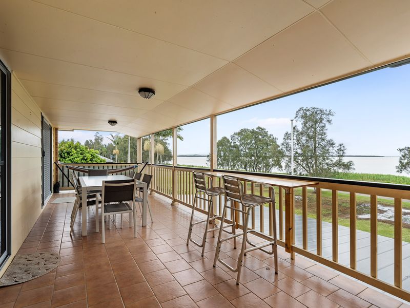 Enjoy your morning coffee or evening cocktail with scenic lake views and cozy seating.