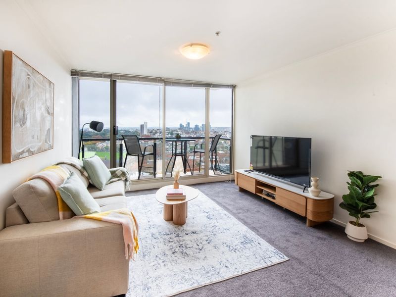 Light filled living space with plush furnishings