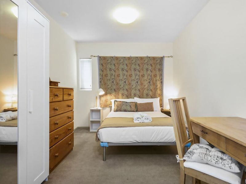 Bedroom with dedicated workspace