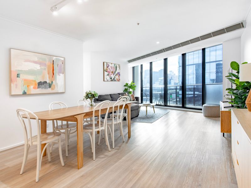 Open-plan dining and living area with outside views