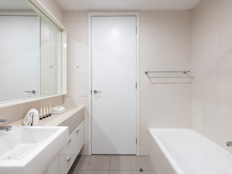 Relaxing bathroom with a comfortable bathtub.